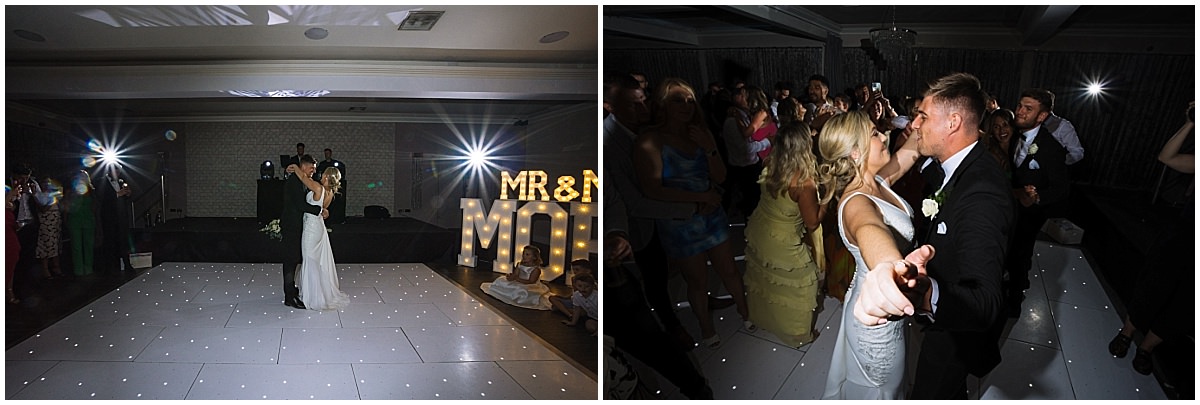 A newlywed couple shares a dance while surrounded by joyous guests at a lively reception, highlighted by decorative lights and a dance floor.